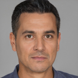 Neutral white adult male with short  brown hair and brown eyes