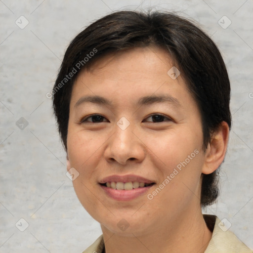 Joyful asian young-adult female with short  brown hair and brown eyes