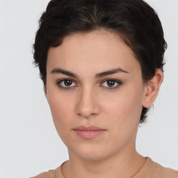 Neutral white young-adult female with short  brown hair and brown eyes