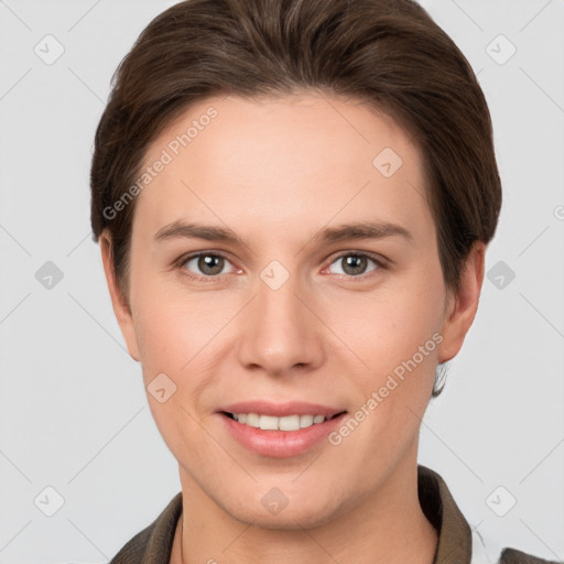 Joyful white young-adult female with short  brown hair and brown eyes