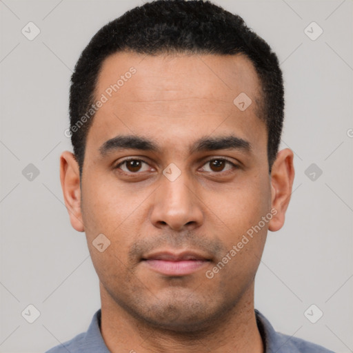 Neutral latino young-adult male with short  black hair and brown eyes