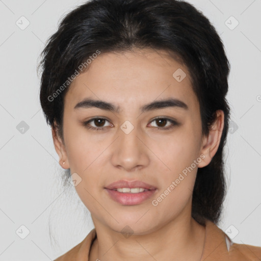 Joyful latino young-adult female with short  brown hair and brown eyes