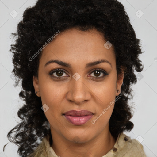 Joyful black young-adult female with long  brown hair and brown eyes