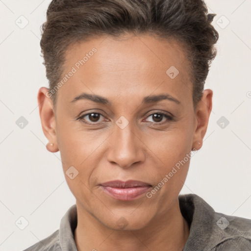 Joyful white adult female with short  brown hair and brown eyes