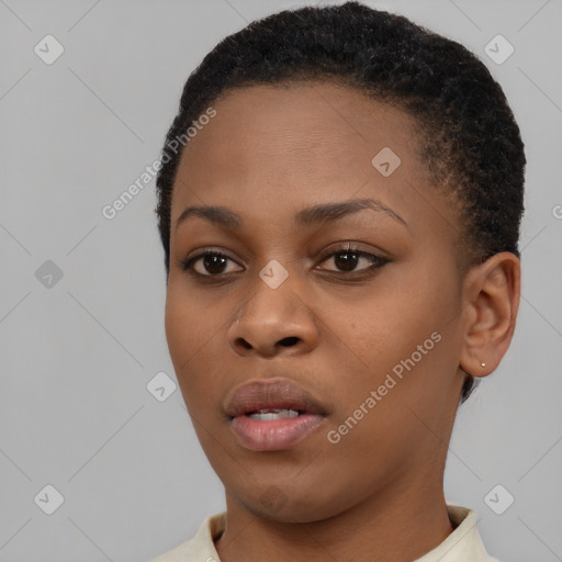 Neutral black young-adult female with short  brown hair and brown eyes