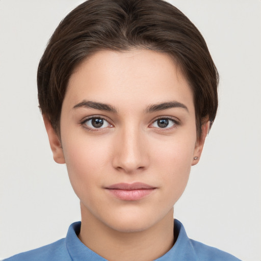 Neutral white young-adult female with short  brown hair and brown eyes