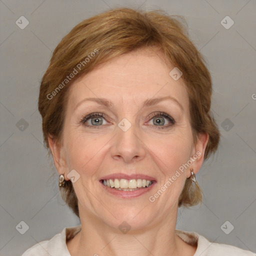 Joyful white adult female with medium  brown hair and blue eyes