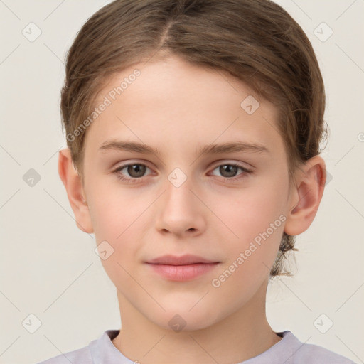 Joyful white child female with short  brown hair and brown eyes