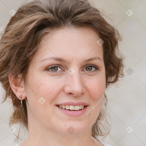 Joyful white young-adult female with medium  brown hair and green eyes