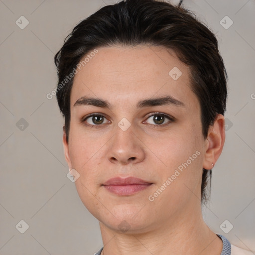 Joyful white young-adult female with short  brown hair and brown eyes