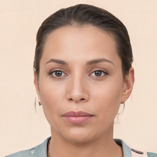 Neutral white young-adult female with short  brown hair and brown eyes