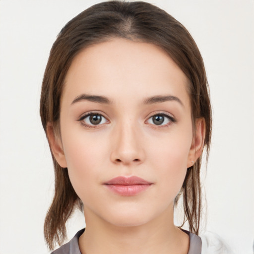 Neutral white young-adult female with medium  brown hair and brown eyes