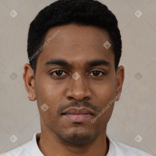 Neutral latino young-adult male with short  black hair and brown eyes