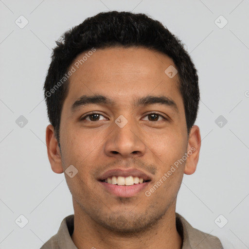 Joyful latino young-adult male with short  black hair and brown eyes