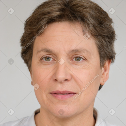 Joyful white adult male with short  brown hair and grey eyes