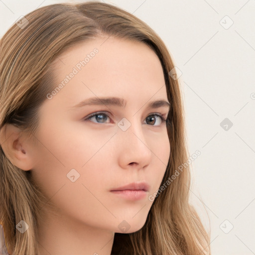 Neutral white young-adult female with long  brown hair and brown eyes