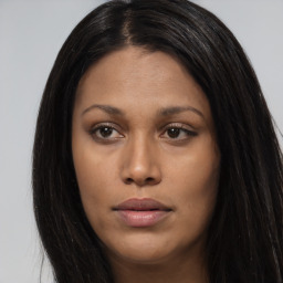 Joyful asian young-adult female with long  brown hair and brown eyes