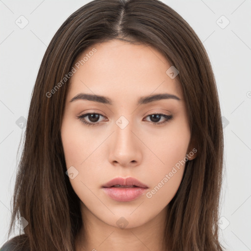 Neutral white young-adult female with long  brown hair and brown eyes