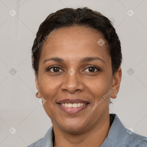 Joyful white adult female with short  brown hair and brown eyes