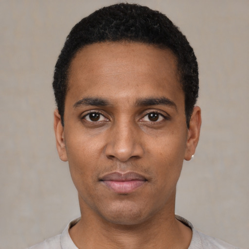 Neutral black young-adult male with short  black hair and brown eyes