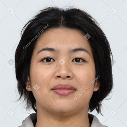 Joyful asian young-adult female with medium  brown hair and brown eyes