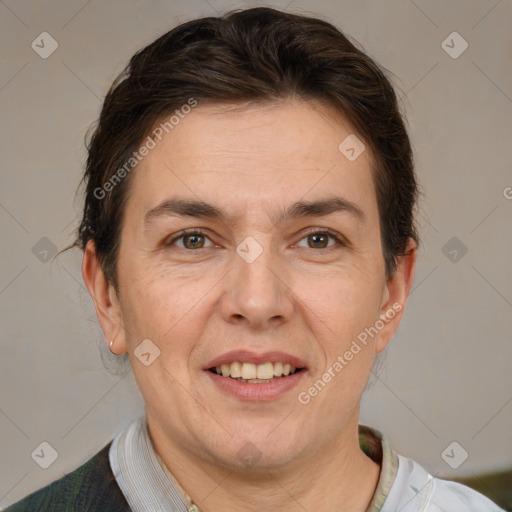 Joyful white adult female with short  brown hair and brown eyes