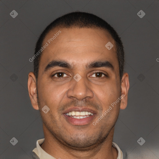 Joyful latino young-adult male with short  brown hair and brown eyes