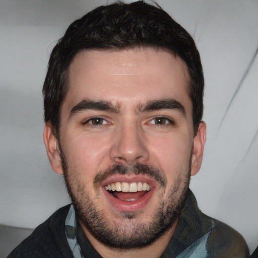 Joyful white young-adult male with short  black hair and brown eyes