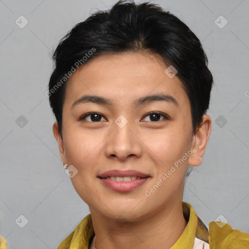 Joyful asian young-adult female with short  brown hair and brown eyes