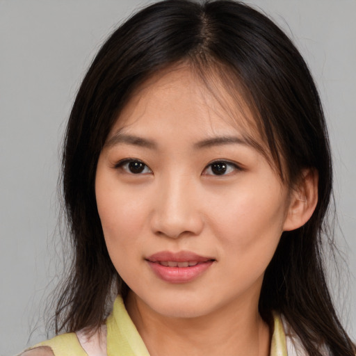 Neutral asian young-adult female with medium  brown hair and brown eyes