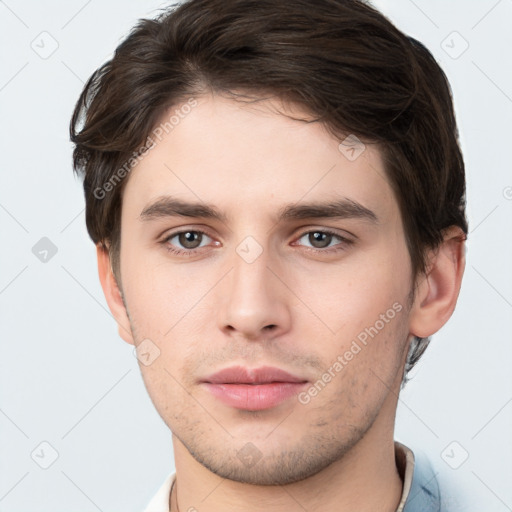 Neutral white young-adult male with short  brown hair and brown eyes