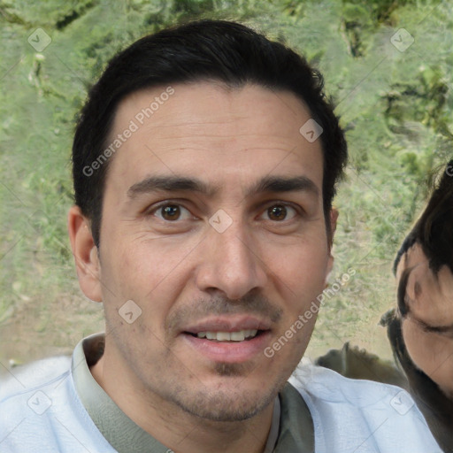 Joyful white adult male with short  brown hair and brown eyes