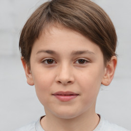 Joyful white child female with short  brown hair and brown eyes