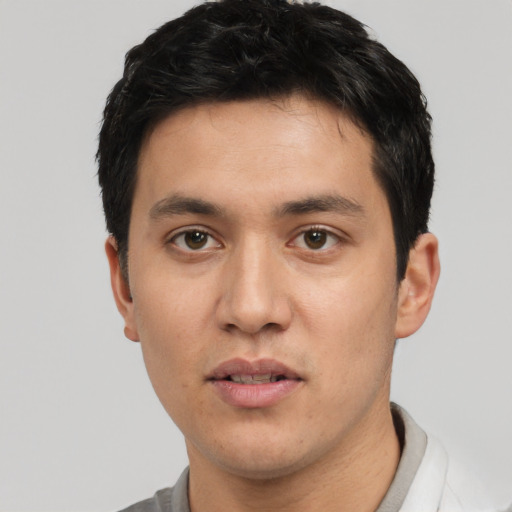 Neutral white young-adult male with short  black hair and brown eyes