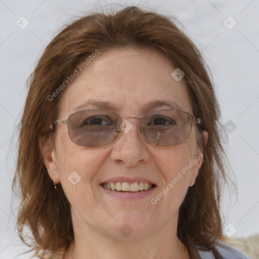 Joyful white adult female with medium  brown hair and brown eyes