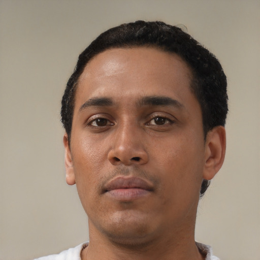 Neutral black young-adult male with short  black hair and brown eyes
