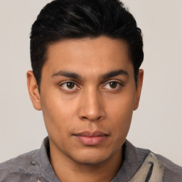 Neutral latino young-adult male with short  black hair and brown eyes