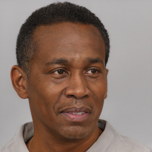 Neutral black adult male with short  black hair and brown eyes
