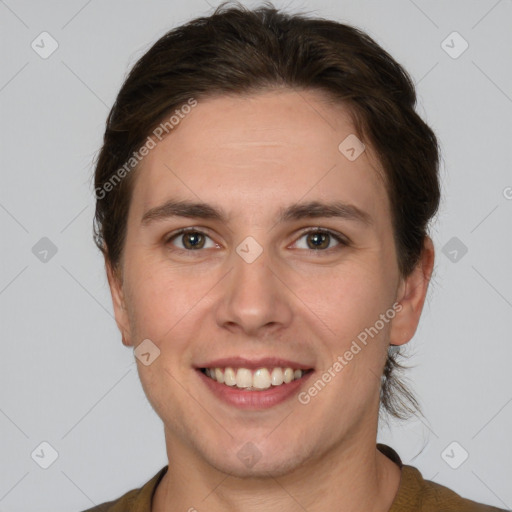 Joyful white young-adult female with short  brown hair and brown eyes