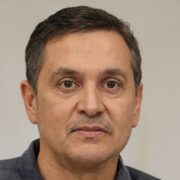Neutral white adult male with short  brown hair and brown eyes