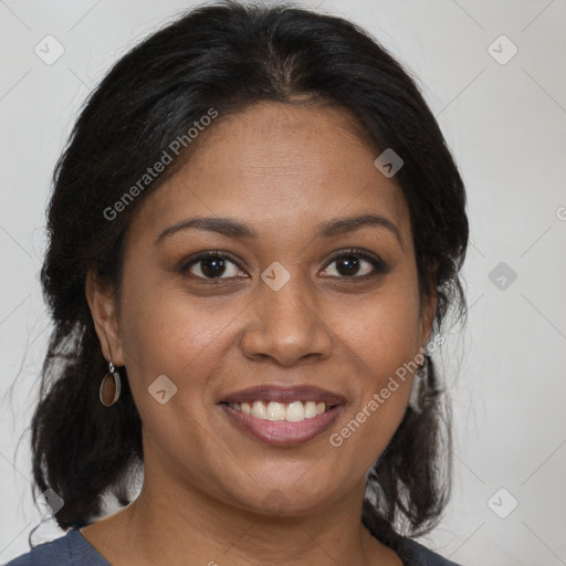 Joyful black young-adult female with medium  brown hair and brown eyes