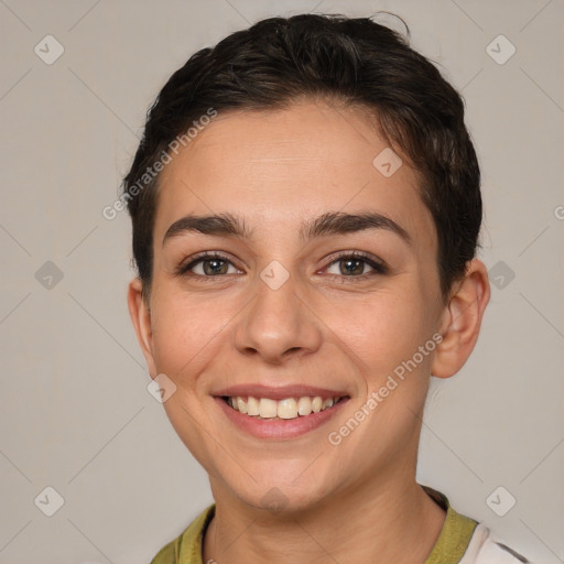 Joyful white young-adult female with short  brown hair and brown eyes