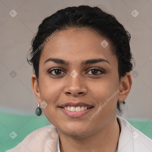 Joyful latino young-adult female with short  brown hair and brown eyes