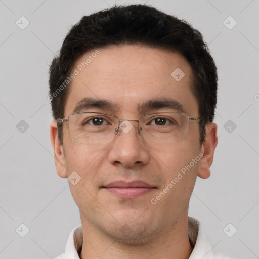 Joyful white adult male with short  brown hair and brown eyes