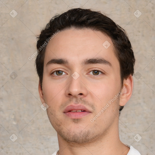 Neutral white young-adult male with short  black hair and brown eyes