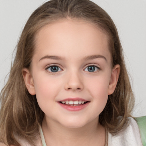 Joyful white child female with medium  brown hair and brown eyes