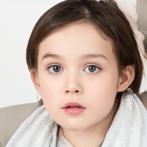 Neutral white child female with medium  brown hair and brown eyes