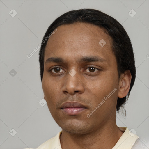 Neutral black young-adult male with short  black hair and brown eyes