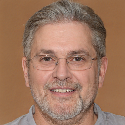 Joyful white middle-aged male with short  gray hair and brown eyes