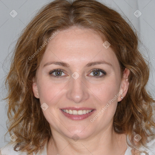 Joyful white young-adult female with medium  brown hair and blue eyes